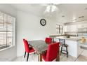 Eat-in kitchen area with a table and chairs and a window for natural light at 20419 N 34Th St, Phoenix, AZ 85050