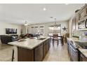 Open-concept kitchen and dining area, perfect for gatherings, featuring modern finishes and plenty of light at 24816 S Golfview Dr # 46, Sun Lakes, AZ 85248