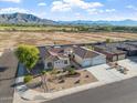 Beautiful home boasts meticulously landscaped front yard and convenient three-car garage at 3125 W Desert Ln, Laveen, AZ 85339
