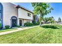 Charming townhome featuring well-maintained landscaping and inviting curb appeal with mature trees at 3820 N 30Th St, Phoenix, AZ 85016