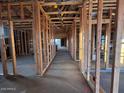 Interior view of wood framing, showcasing the skeleton of the new home's construction at 5638 W Olney Ave, Laveen, AZ 85339