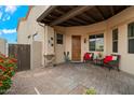 Cozy front patio with comfortable seating, decorative accents, and covered entryway at 6202 E Mckellips Rd # 65, Mesa, AZ 85215