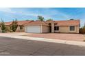 Attractive home boasting a clean facade, attached garage, and easy access street at 6416 S 19Th Pl, Phoenix, AZ 85042