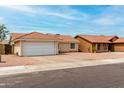 Lovely single-Gathering home featuring a classic design and low-maintenance desert landscaping at 6416 S 19Th Pl, Phoenix, AZ 85042