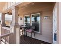 Welcoming front porch with seating, perfect for relaxing and enjoying the neighborhood at 9333 E University Dr # 194, Mesa, AZ 85207