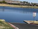 Estrella Yacht Club and community lake featuring waterfront access for residents to enjoy at 10489 S 182Nd Dr, Goodyear, AZ 85338