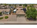 Charming single-Gathering home featuring a two-car garage, solar panels, and a private RV parking area at 1182 E Canyon Way, Chandler, AZ 85249