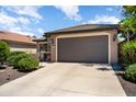 Lovely single-story home showcasing a large two-car garage and beautiful landscaping at 20523 N 267Th Ln, Buckeye, AZ 85396