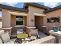 Cozy patio with outdoor seating, perfect for relaxation and enjoying the outdoors at 20523 N 267Th Ln, Buckeye, AZ 85396