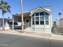 Attractive single-story home with covered parking, showcasing a clean and modern design at 381 S Gypsum Dr, Apache Junction, AZ 85119