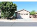 Inviting single-story home with a two-car garage and established landscaping at 3850 E Balsam Dr, Chandler, AZ 85286