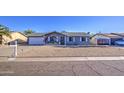 Well-maintained single-story home with gravel landscaping and a cozy, inviting entrance at 1529 W Wickieup Ln, Phoenix, AZ 85027