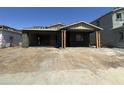 Exterior of a home under construction with a two-car garage and a covered front porch at 22812 E Lords Way, Queen Creek, AZ 85142