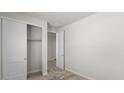 Unfurnished bedroom with a closet and neutral carpet for a clean and versatile space at 2530 N Pony Ln, Casa Grande, AZ 85122