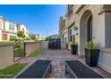 Townhouse patio with chairs and grill for enjoying the outdoors at 4077 S Sabrina Dr # 14, Chandler, AZ 85248