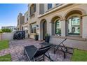 Townhouse patio featuring brick pavers, lounge seating and an outdoor grill for cooking at 4077 S Sabrina Dr # 14, Chandler, AZ 85248