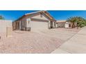 Charming single-story home featuring a two-car garage and low-maintenance desert landscaping at 914 E Pedro Rd, Phoenix, AZ 85042