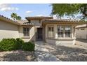 Inviting home entrance with desert landscaping and a well-maintained walkway at 15434 W Big Sky Dr, Surprise, AZ 85374