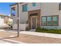Charming home featuring a stone facade, a private walkway, and desert landscaping at 1851 E Frye Rd # 101, Gilbert, AZ 85295