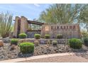 Elegant entrance to Fireside at Norterra by Del Webb, showcasing lush landscaping at 2118 W Hunter Ct # 136, Phoenix, AZ 85085