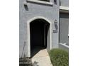 The entryway features an arched entrance, providing a warm welcome at 2402 E 5Th St # 1428, Tempe, AZ 85288