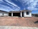 New construction home with an open garage and covered porch, still in the process of being completed at 4344 E Brook Lynn Pl, San Tan Valley, AZ 85140