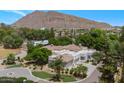 Expansive desert property featuring mature trees, private driveway and mountain view at 6243 E Camelback Rd, Scottsdale, AZ 85251