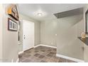 Entryway with tile floors and view of the stairs at 12517 W Santa Fe Ln, El Mirage, AZ 85335