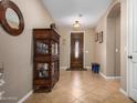 Inviting foyer featuring neutral tones and tile flooring at 2680 E Lodgepole Dr, Gilbert, AZ 85298