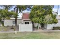 Charming single-story home with a well-maintained lawn, mature trees, and an inviting covered entrance at 6007 N 79Th St, Scottsdale, AZ 85250