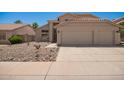 Charming home with a three car garage and desert landscaping at 1431 W Mountain Sky Ave, Phoenix, AZ 85045