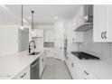 Beautiful kitchen with an island, stainless appliances, and white cabinets at 24152 N 172Nd Ave, Surprise, AZ 85387