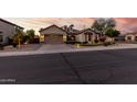 Charming single-story home with a well-manicured lawn and a spacious two-car garage at 3150 E Isaiah Ave, Gilbert, AZ 85298