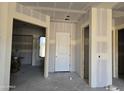 Unfinished interior featuring drywall, doorways, and flooring, ready for customization to fit your unique style and needs at 34889 N 3Rd St, Phoenix, AZ 85086
