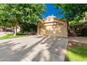 Charming home featuring a spacious driveway and well-maintained landscaping at 4747 N 84Th Way, Scottsdale, AZ 85251