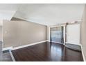 Bright living room featuring hardwood floors and natural light at 742 E Garnet Ave, Mesa, AZ 85204