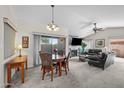 A delightful living space with fireplace, ceiling fan, and access to the backyard patio at 945 N Pasadena -- # 35, Mesa, AZ 85201