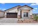 Attractive single-Gathering home featuring a two-car garage, well-maintained landscaping, and a welcoming entrance at 20302 W Turney Ave, Buckeye, AZ 85396