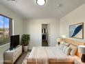 Inviting main bedroom with walk in closet offers a serene retreat with a view of the picturesque landscape at 6602 S 23Rd Ave, Phoenix, AZ 85041