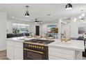 Stylish kitchen island with modern appliances, sleek countertops, and an open concept design at 3009 E Whitton Ave, Phoenix, AZ 85016