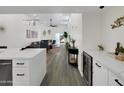 The spacious living room has nice decor, an open floorplan, and neutral walls at 3401 N 37 St # 14, Phoenix, AZ 85018