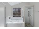 Bright bathroom with a tub, glass-enclosed shower, and modern finishes at 4031 N Ranier --, Mesa, AZ 85215
