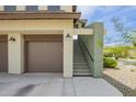 Garage and exterior stairs to second story at 5100 E Rancho Paloma Dr # 2078, Cave Creek, AZ 85331