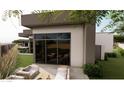 Backyard patio with outdoor seating area, perfect for relaxing or entertaining guests at 7141 E Ironwood Dr, Paradise Valley, AZ 85253