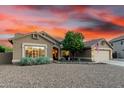 Charming single-story home featuring a low-maintenance desert landscape and a convenient two-car garage at 28802 N 45Th St, Cave Creek, AZ 85331
