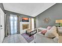 Inviting living room with a stylish brick fireplace, large windows, and comfortable seating, creating a relaxing atmosphere at 633 W Southern Ave # 1131, Tempe, AZ 85282