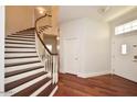 Welcoming foyer with hardwood floors and a staircase at 645 S 54Th St, Mesa, AZ 85206