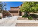 Attractive two-story home featuring desert landscaping and a two-car garage at 6746 W Wethersfield Rd, Peoria, AZ 85381