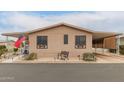 Inviting single-story home with covered parking and tidy desert landscaping at 11596 W Sierra Dawn Blvd # 307, Surprise, AZ 85378