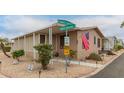 Charming corner lot home with desert landscaping and street signage at 11596 W Sierra Dawn Blvd # 307, Surprise, AZ 85378